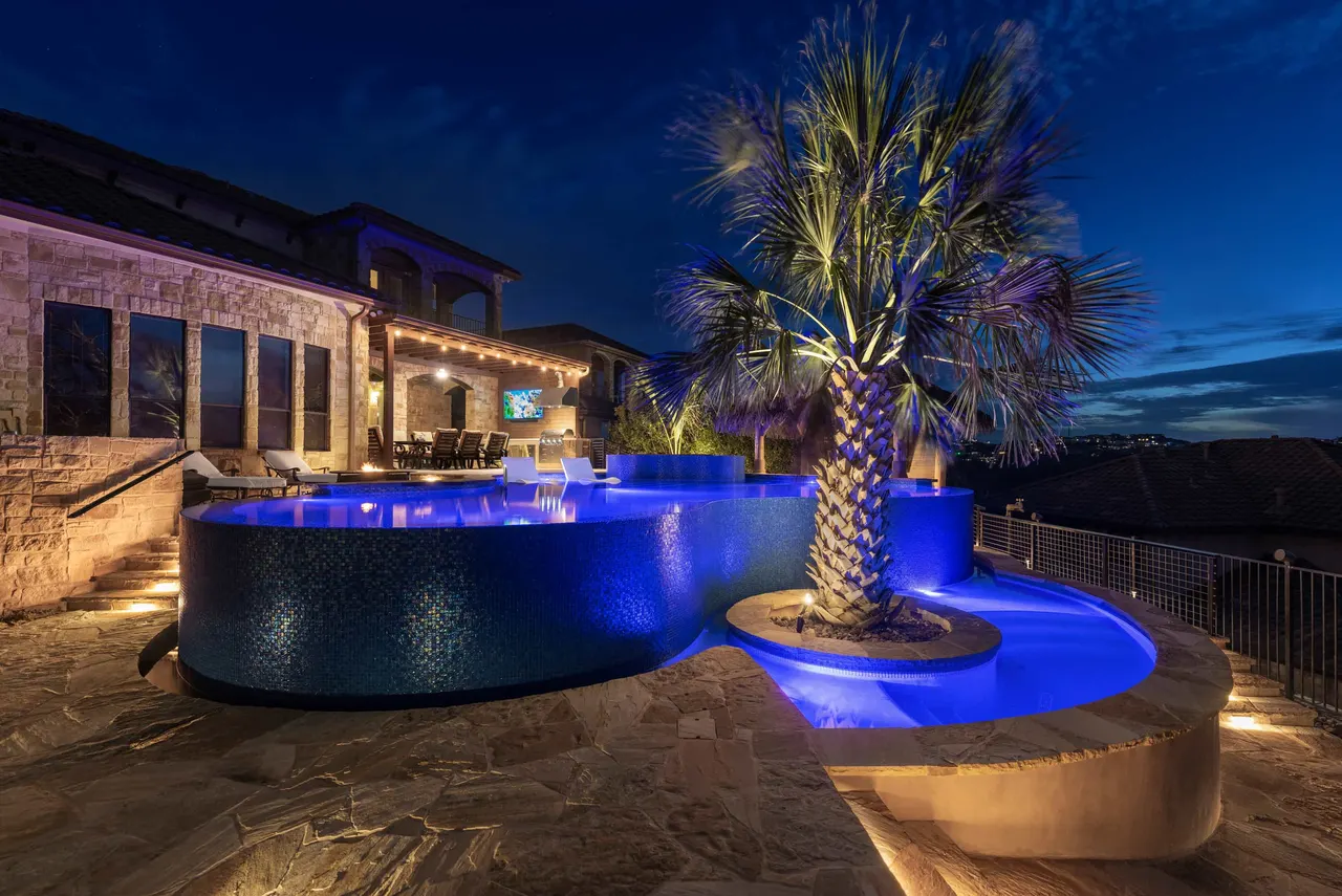 Boulder Slide — Family freeform pool in Tarrytown, TX by GB IV Designs (photo 15)