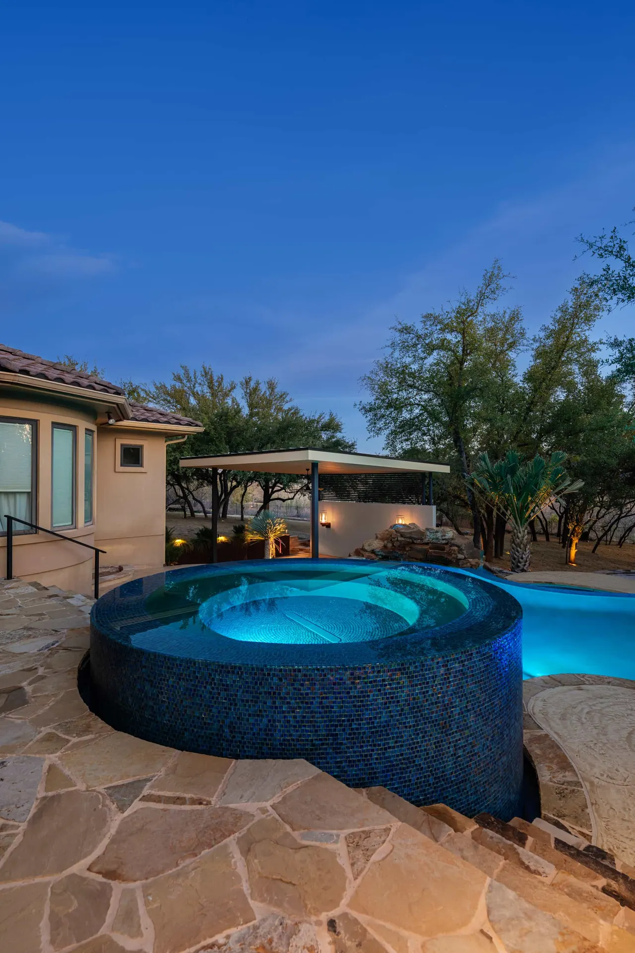 Boulder Slide — Family freeform pool in Tarrytown, TX by GB IV Designs (photo 18)