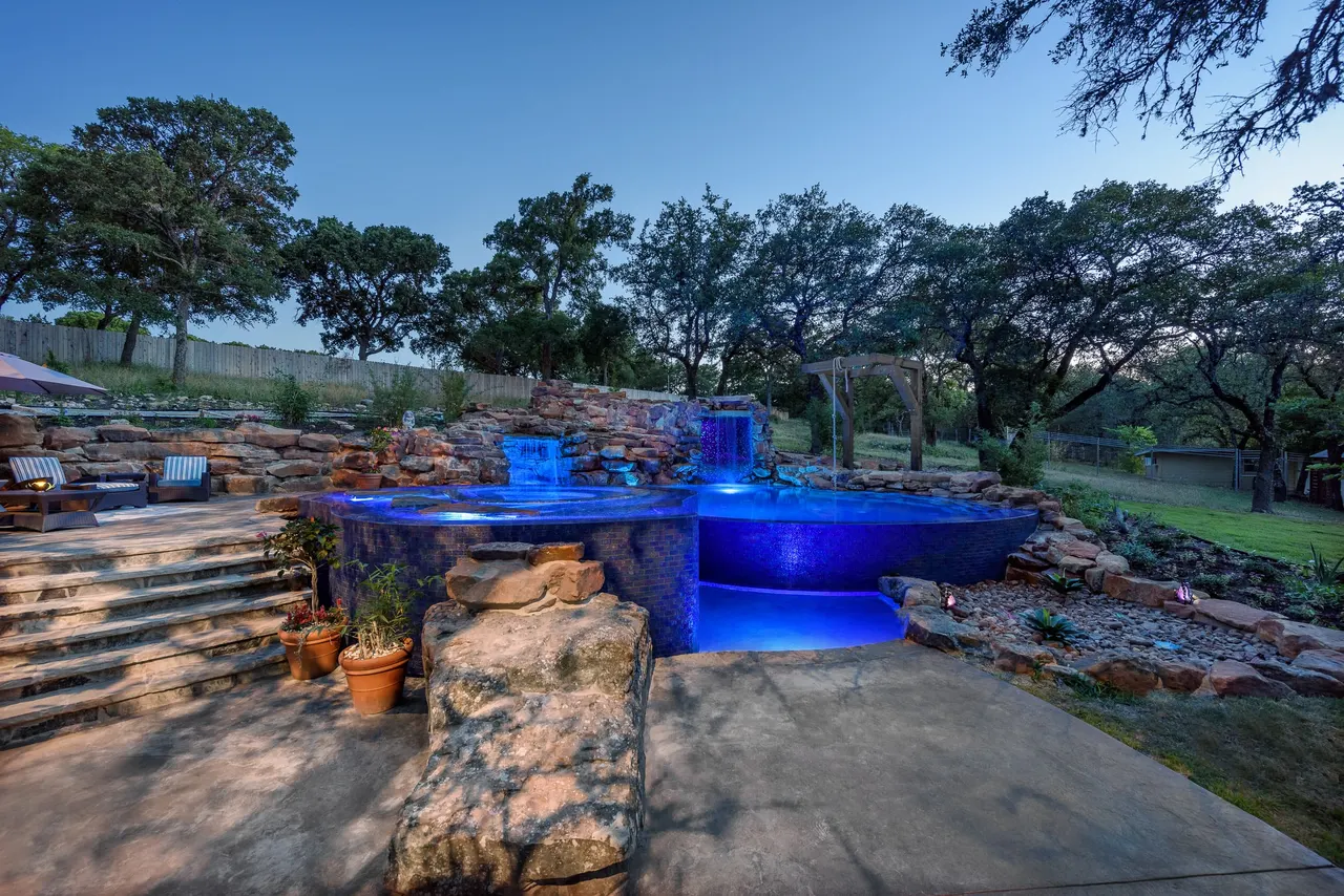 Grotto Waterfall — Freeform pool & grotto in Texas Hill Country, TX by GB IV Designs (photo 9)