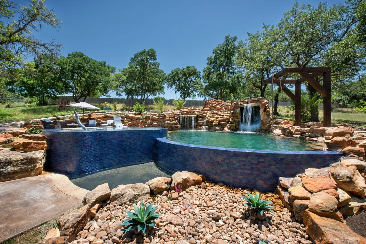 Grotto Waterfall — Freeform pool & grotto in Texas Hill Country, TX by GB IV Designs (photo 15)