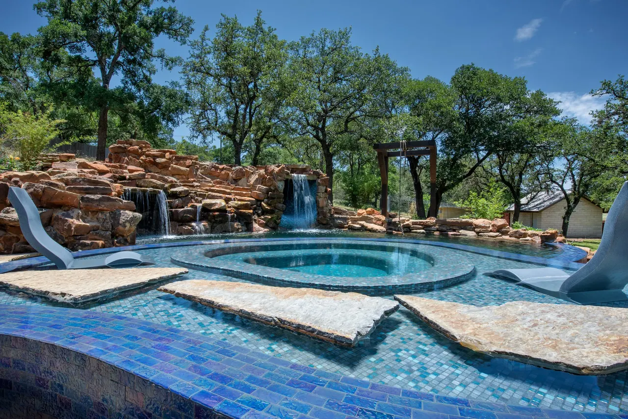 Grotto Waterfall — Freeform pool & grotto in Texas Hill Country, TX by GB IV Designs (photo 16)