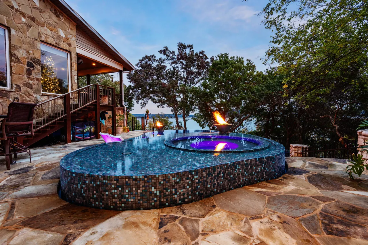 Lakeside Glass — Renovation & vanishing-edge spa in Dripping Springs, TX by GB IV Designs