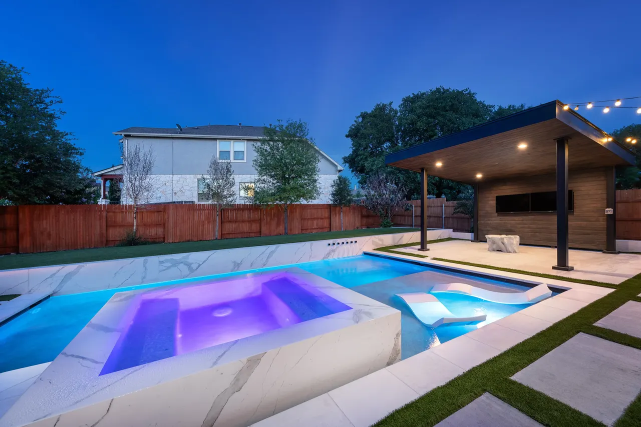 Marble Courtyard — Compact modern pool in Dripping Springs, TX by GB IV Designs (photo 6)