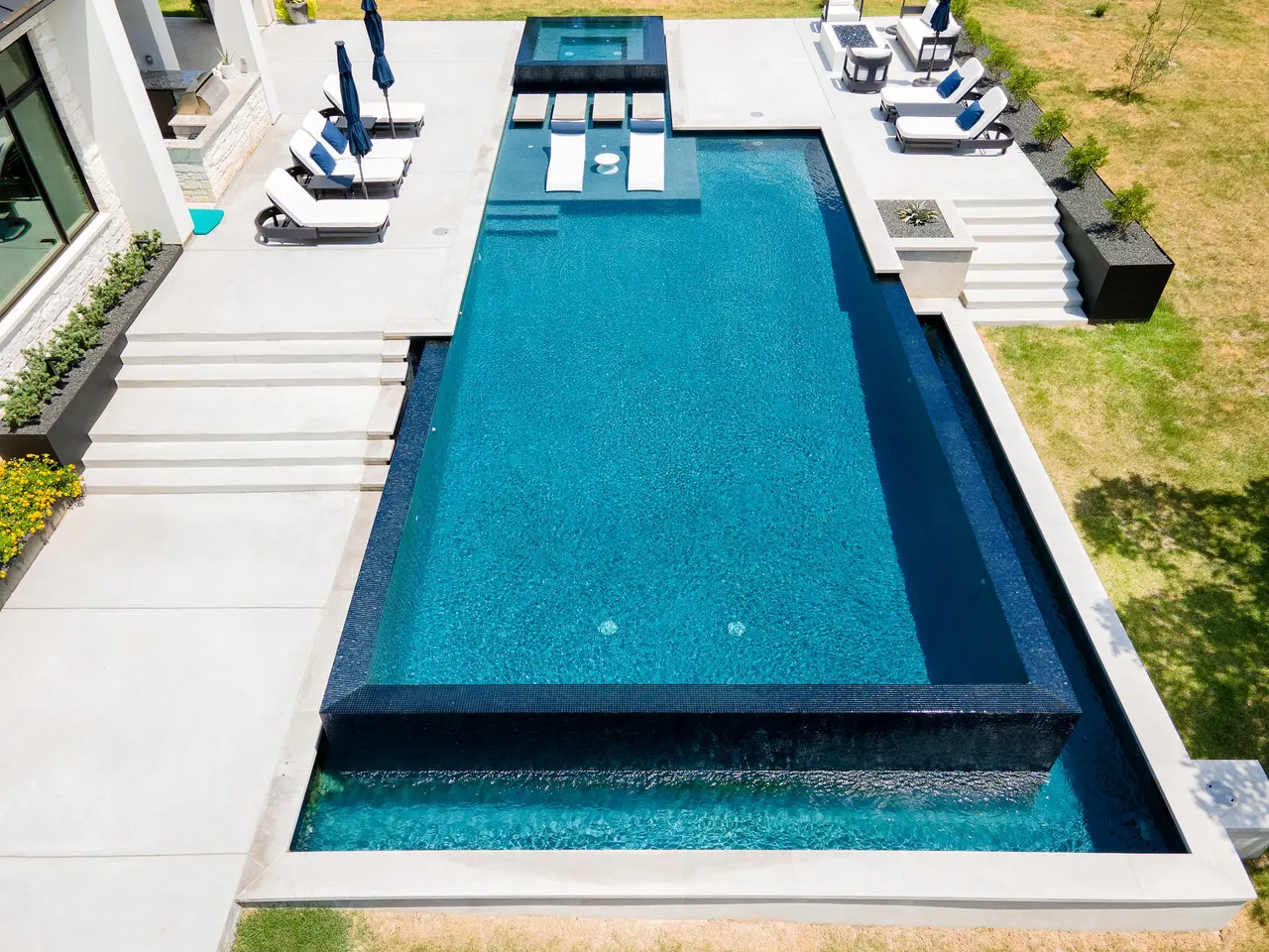 Negative Edge Estate — Vanishing-edge pool & spa in Driftwood, TX by GB IV Designs