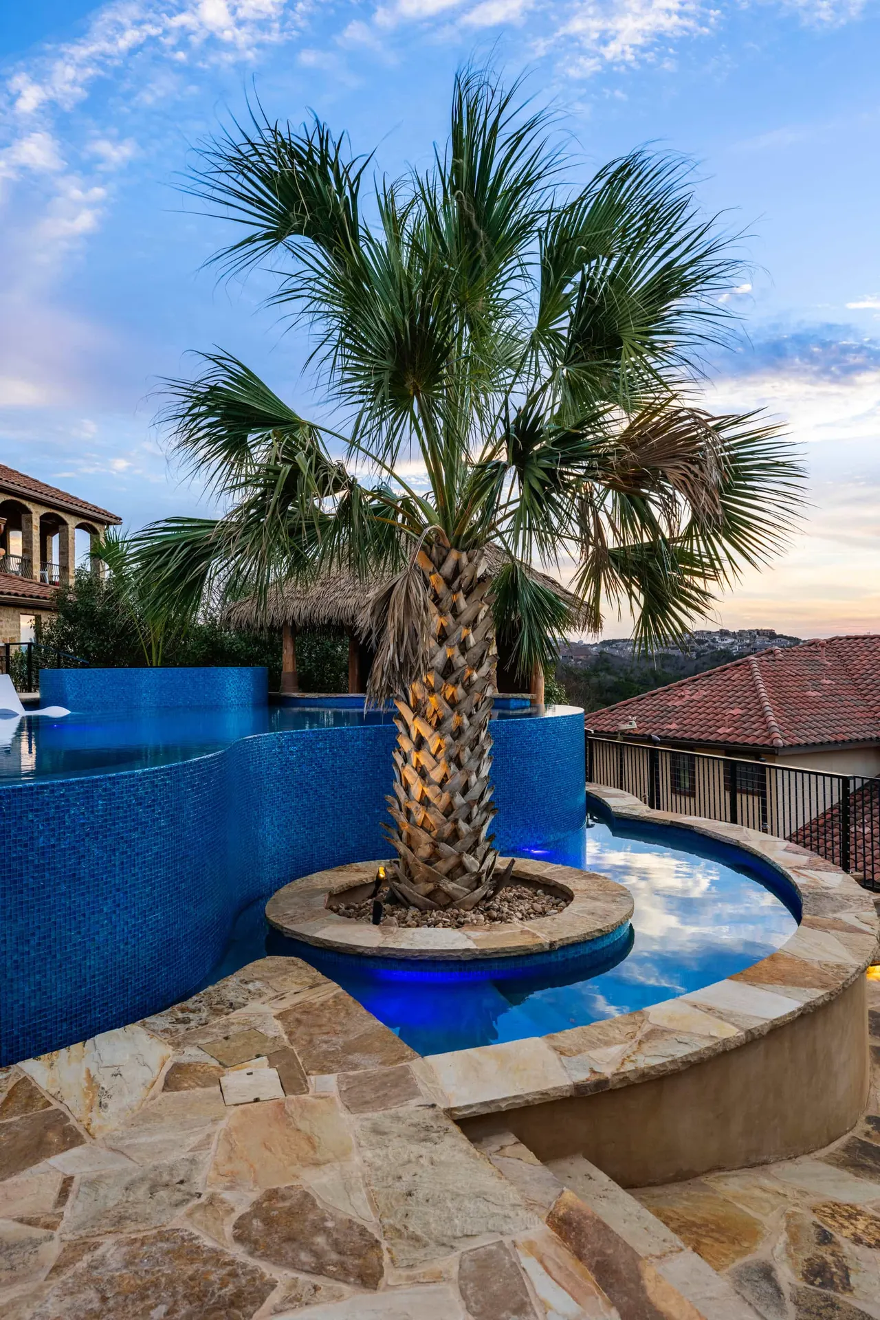 Palapa Lagoon — Freeform vanishing-edge pool in West Lake Hills, TX by GB IV Designs (photo 12)