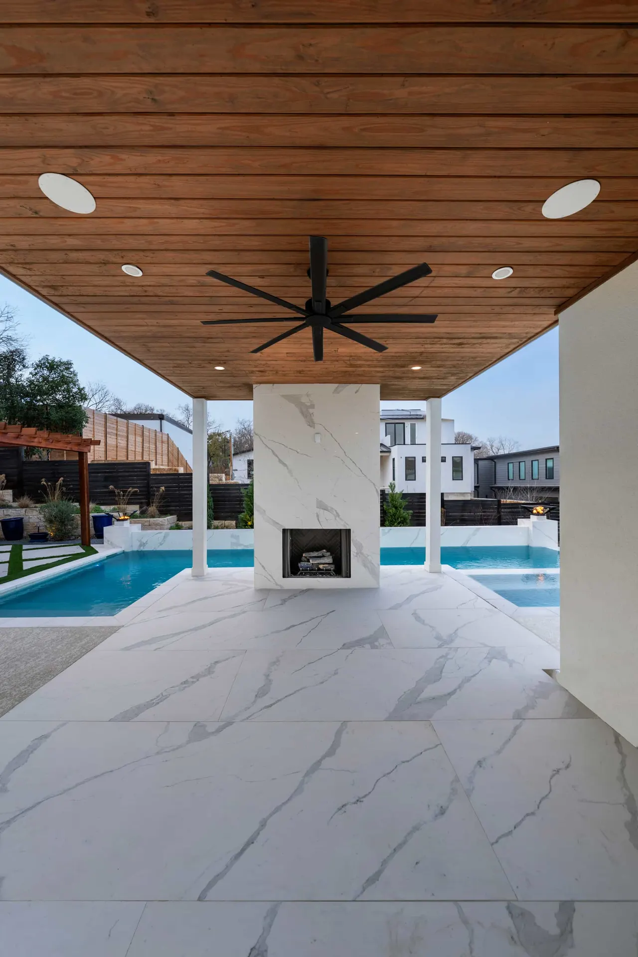 Porcelain Modern — Raised pool & outdoor living in Austin, TX by GB IV Designs (photo 12)