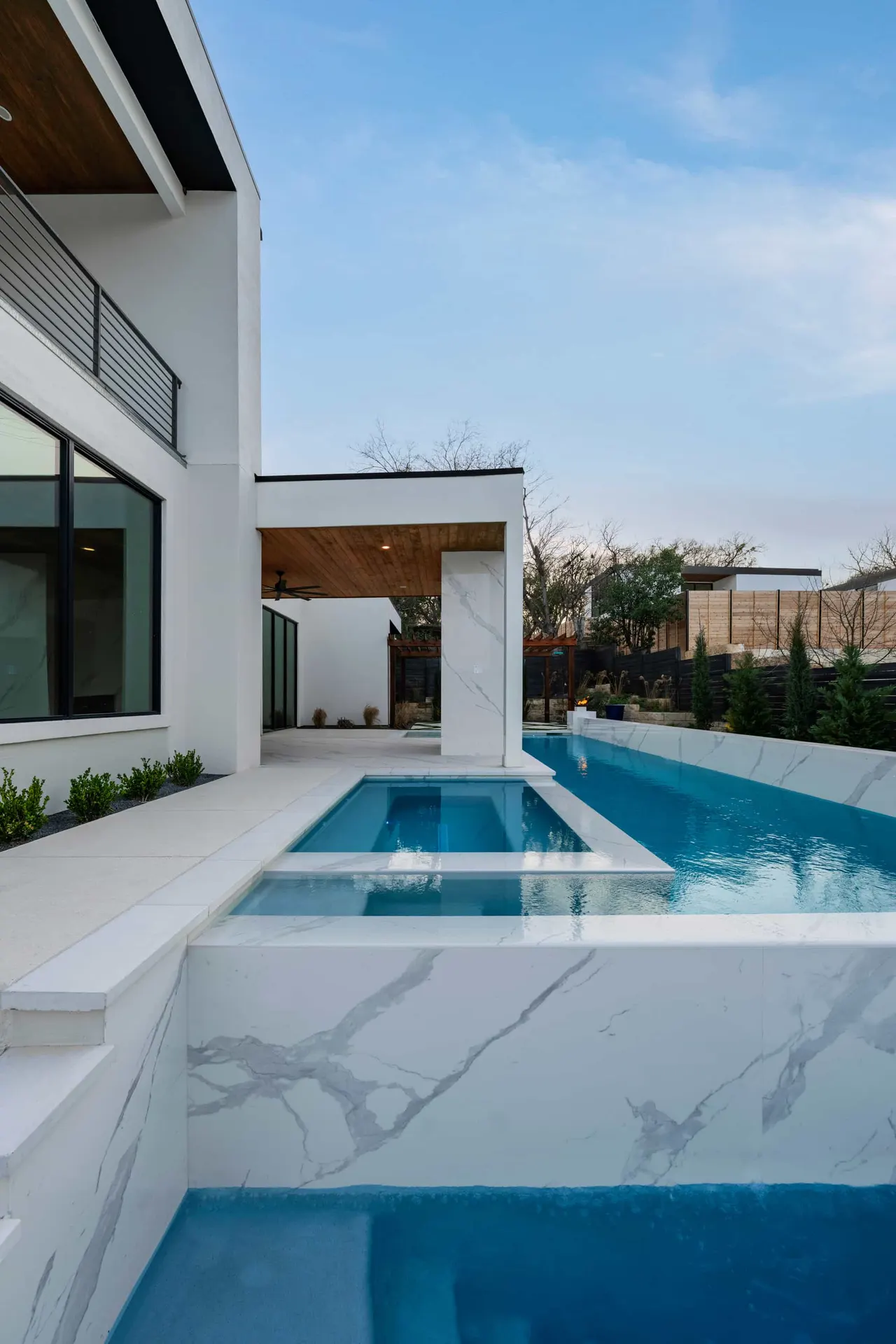Porcelain Modern — Raised pool & outdoor living in Austin, TX by GB IV Designs (photo 13)