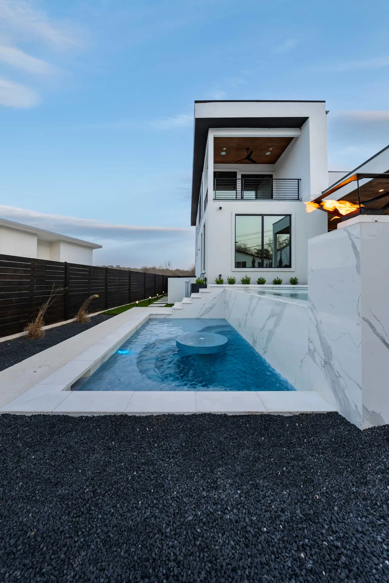 Porcelain Modern — Raised pool & outdoor living in Austin, TX by GB IV Designs (photo 14)