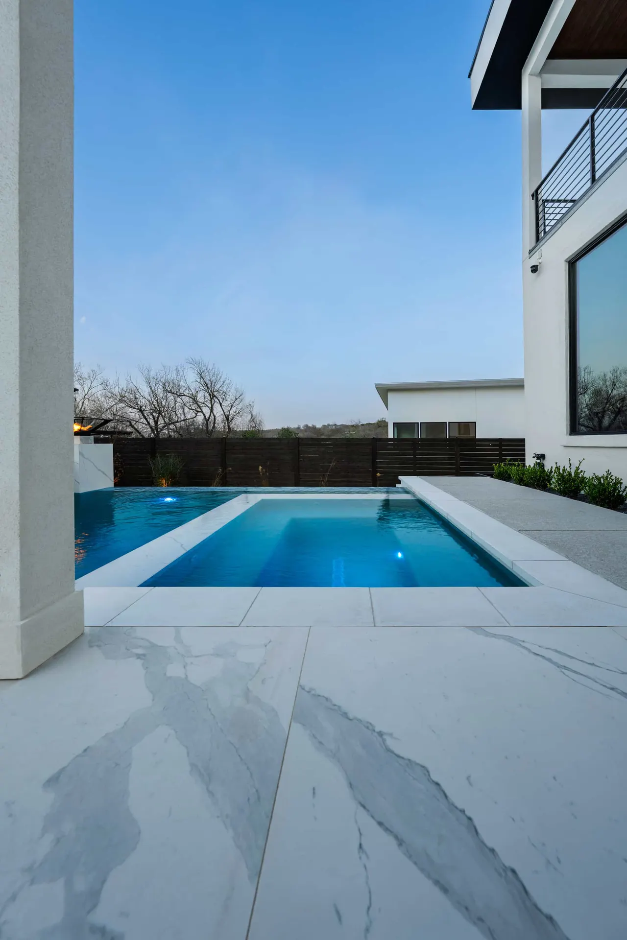 Porcelain Modern — Raised pool & outdoor living in Austin, TX by GB IV Designs (photo 15)