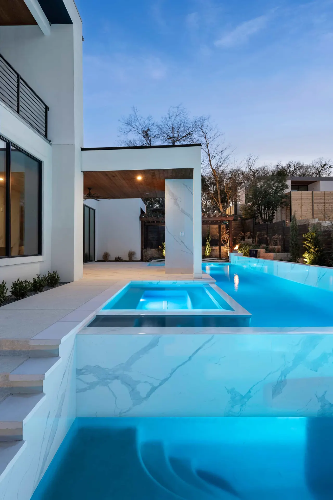 Porcelain Modern — Raised pool & outdoor living in Austin, TX by GB IV Designs (photo 18)