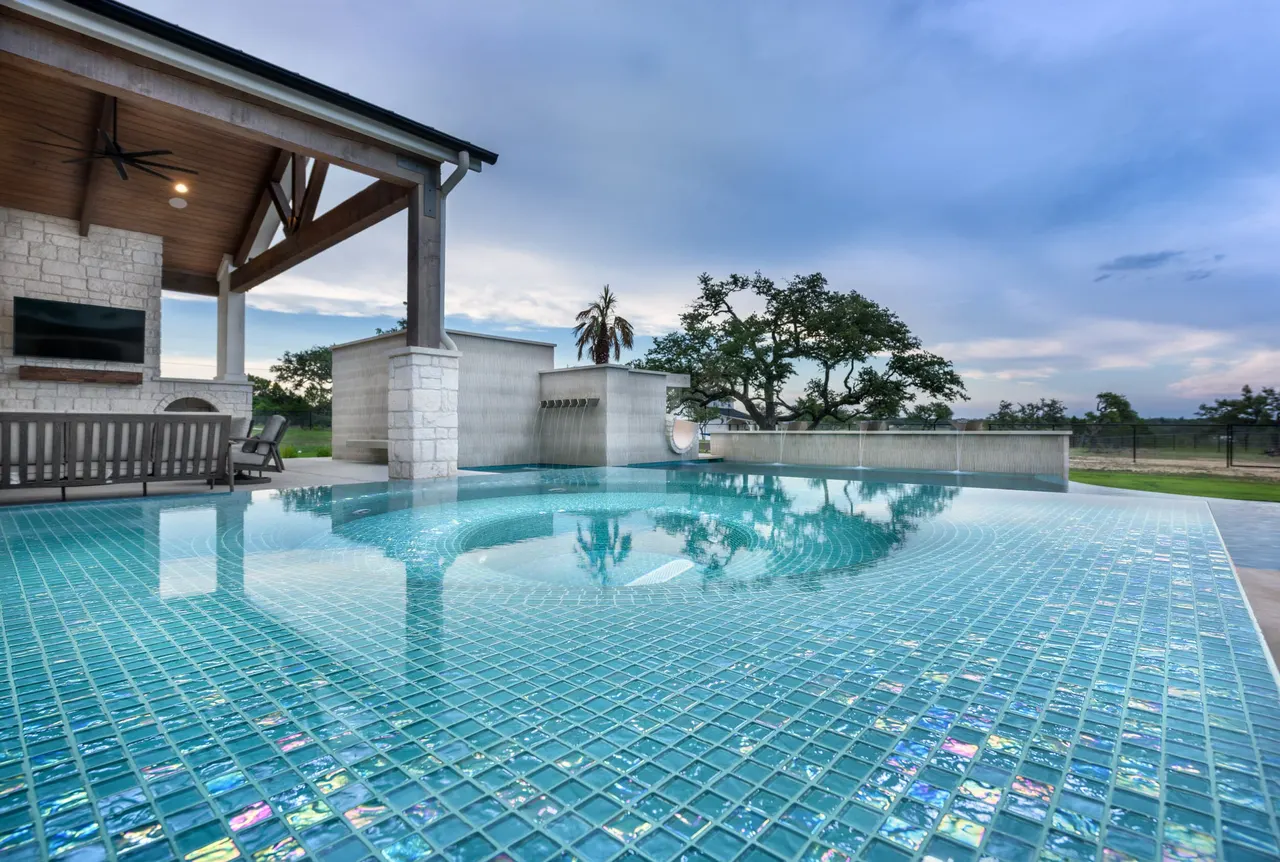 Sculpted Water Walls — Contemporary pool with water features in Bee Cave, TX by GB IV Designs (photo 10)