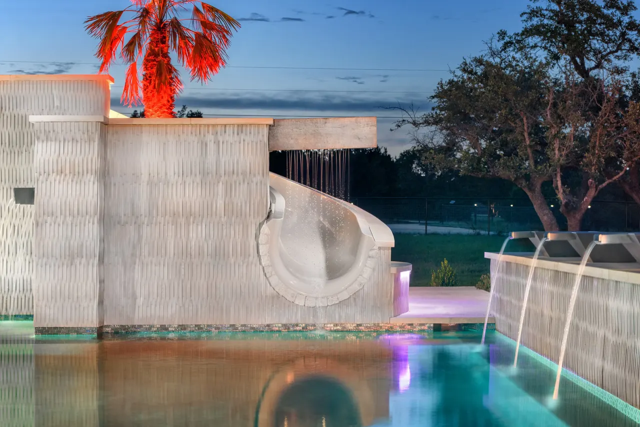 Sculpted Water Walls — Contemporary pool with water features in Bee Cave, TX by GB IV Designs (photo 13)