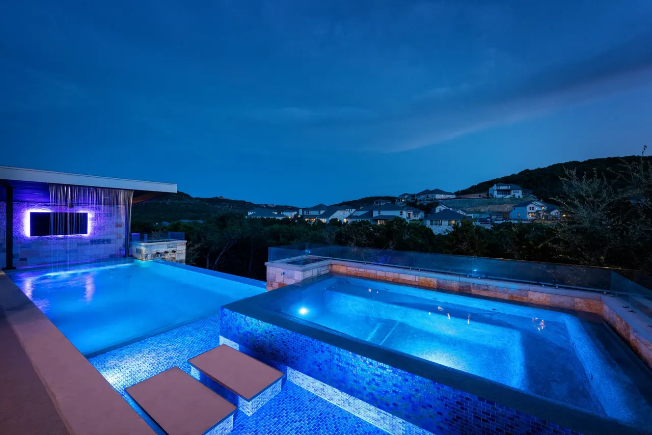 Terraced Modern — Geometric pool & outdoor living in Westlake, TX by GB IV Designs