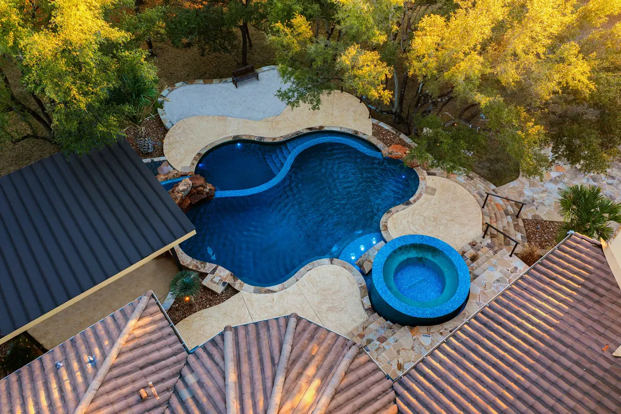 Travertine Lap — Lap pool & spa in Bee Cave, TX by GB IV Designs (photo 10)