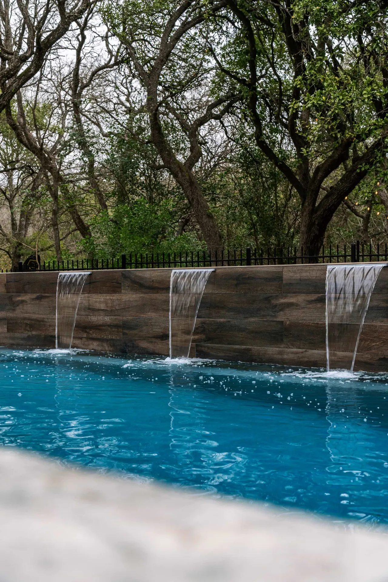 Woodland Geometric — Geometric pool & cabana in Steiner Ranch, TX by GB IV Designs (photo 19)